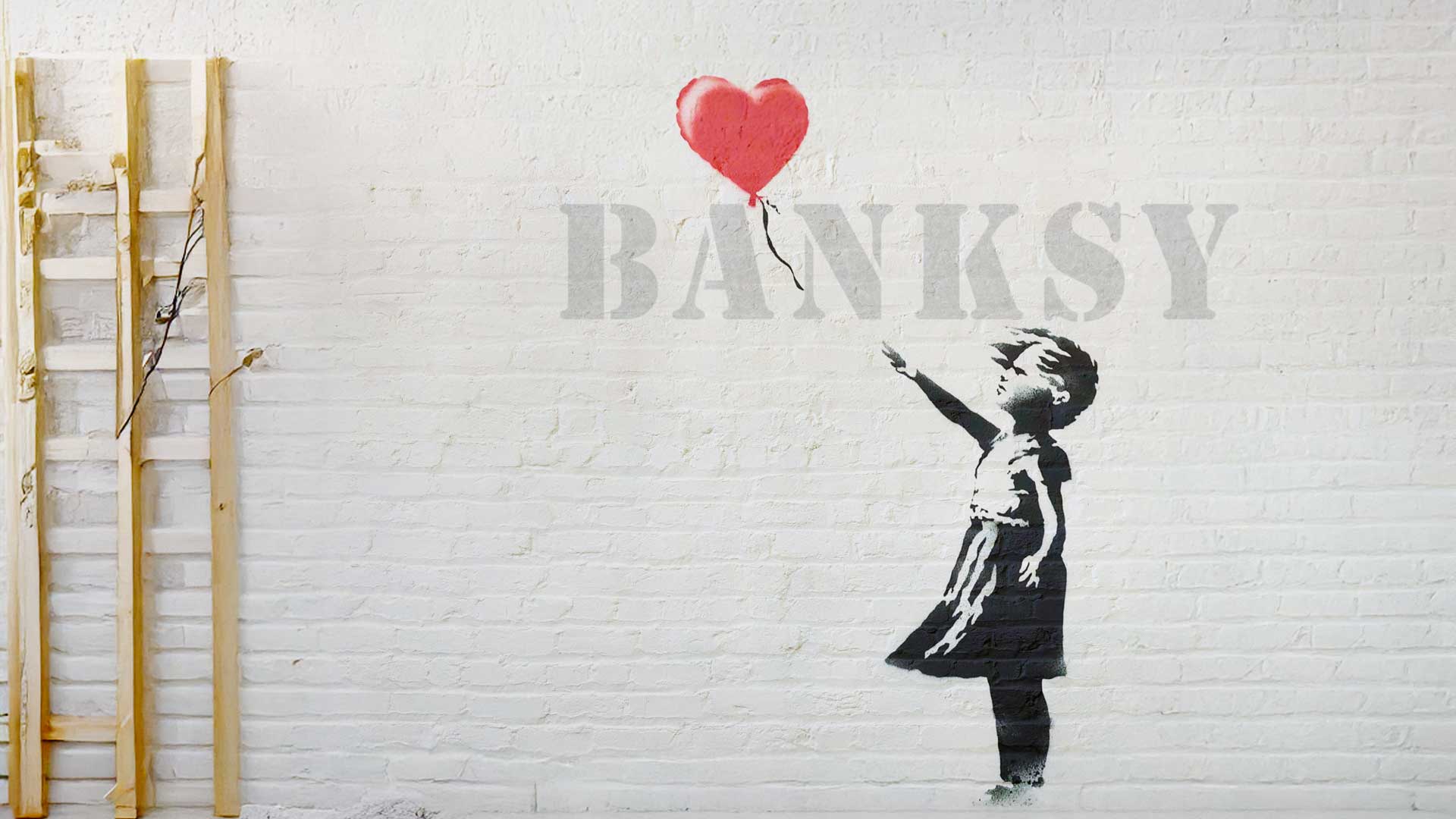 Girl with red balloon - Graffity von Banksy auf Backsteinwand